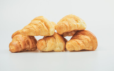 Plain croissant on white background