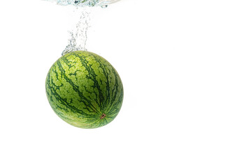 Watermelon splash and sinking isolated against white background