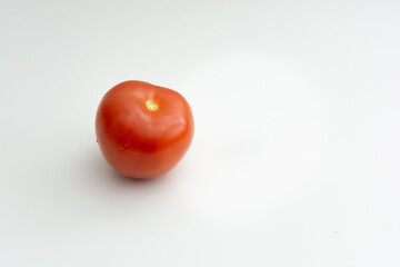 Red isolated tomato placed with white background