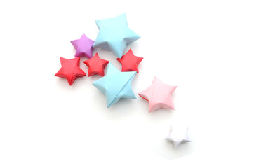 Colorful origami lucky stars on white