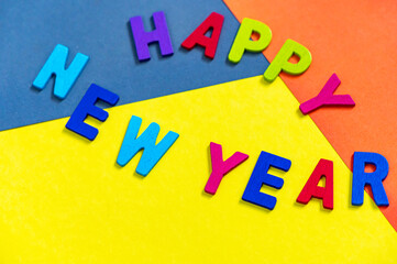 
Happy new year font art colorful texting for greeting or celebrate card with colorful background, Sensitive Focus

