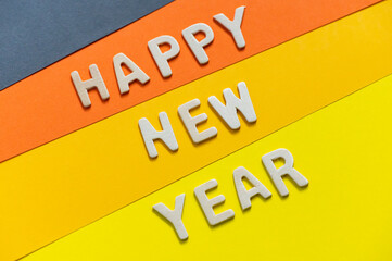 
Happy new year font art colorful texting for greeting or celebrate card with colorful background, Sensitive Focus
