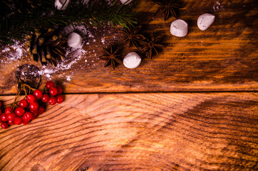 red viburnum. Christmas cones and branches on wooden boards with marshmallows - 401260881