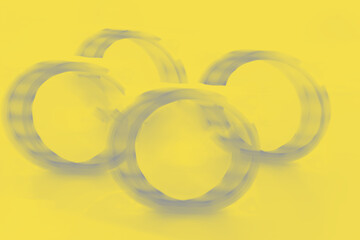 Rings on a yellow background dynamic abstract background with the colors of 2021