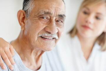 Nurse caring for senior patient