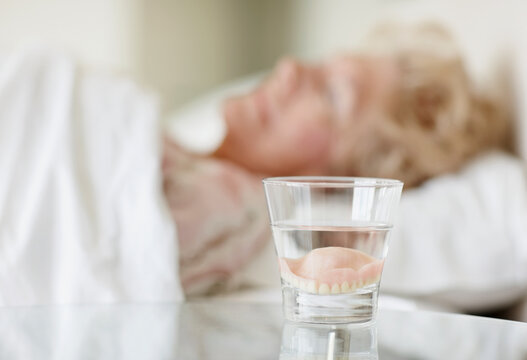 Dentures in a glass of water