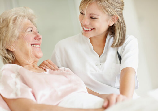 Nurse caring for a senior woman