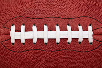 Close up of laces on american football ball