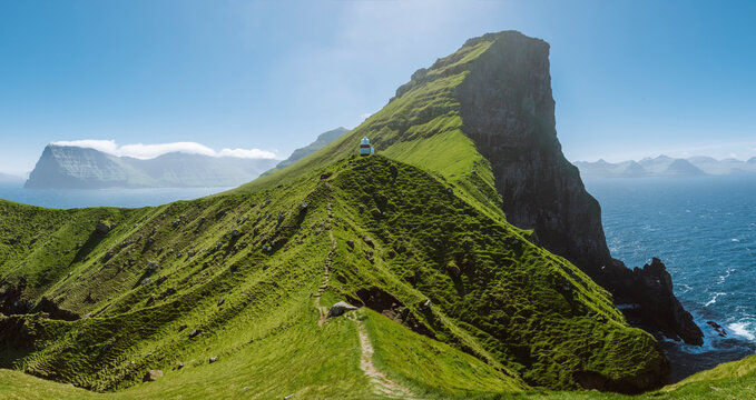Denmark, Faroe Islands, Klaksvik, Trollanes, Kallur Lighthouse on sunny day