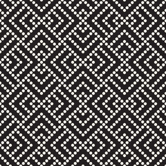Vector seamless pattern. Dotted geometric background. Decorative abstract halftone design with small circles.