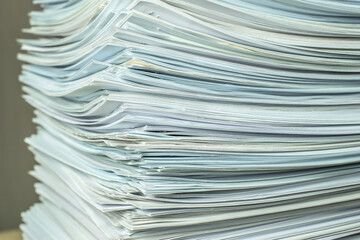 bundles bales of paper documents. stacks packs pile on the desk in the office