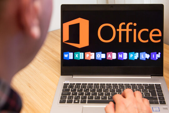 Office 365 is used by a man on the laptop. Microsoft customer used computer software. New product is tested by IT specialist. San Francisco, February 2020.
