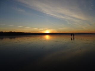 sunset on the frozen lake