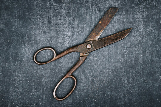 Open Old Tailor Shears On Gray Background, Close Up