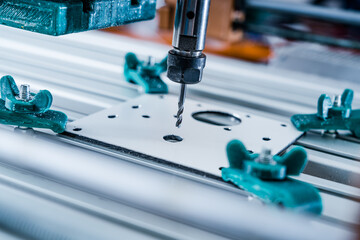 CNC milling machine cutting aluminium  part.