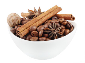 Coffee beans and cinnamon sticks in a Cup isolated on white background
