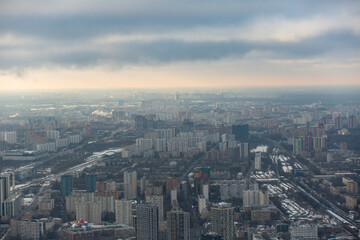 Aerial view of Moscow city in winter. Form from the observation platform of the business center of Moscow City.  Photography from a height of 354 meters.