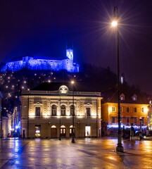 Naklejka premium Ljubljana castle above Ljubljana Philharmony building, Central Slovenia Region