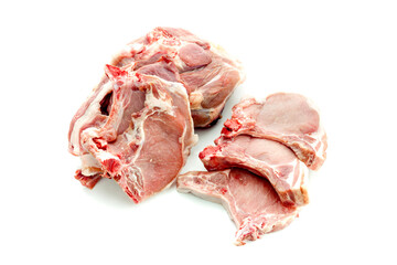 The fresh, raw pieces of pork on a white background close-up