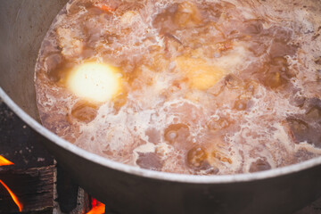 Boiling broth with vegetables. Preparing of Chorba soup