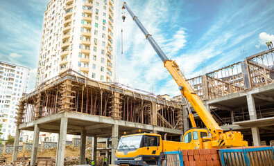 Naklejka premium Crane truck on the construction site