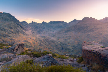 Scenery view of shabby mounts under colorful sky at sundown in Sierra de Gredos
