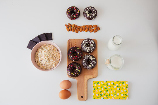 Donuts and ingredients for recipe on table