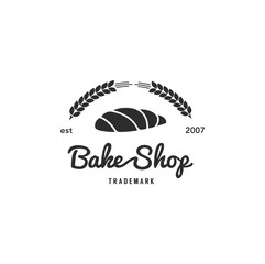The logo of the bakery for bakeries, rolling pin, a rocking roll is depicted, and around the stalks. Baking, Cafe, Shop, Fast Food. Vector illustration logo
