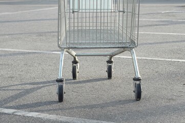 A carts shopping in the car park of a supermarket.