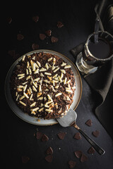 Sweet chocolate pie. Cake with chocolate sprinkles.