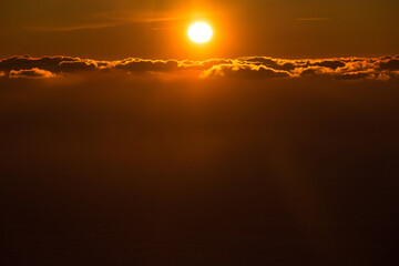 View of the clouds from above at dawn