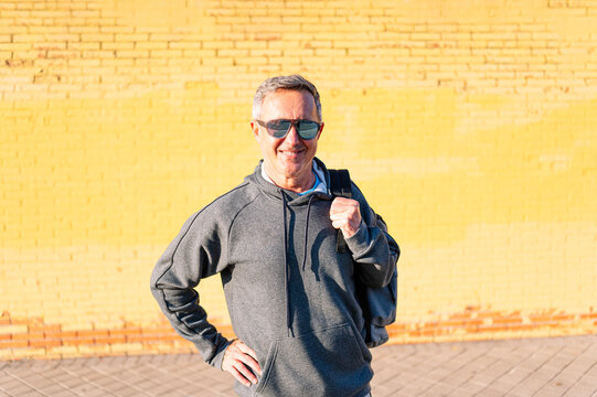 Attractive retired athlete man with sunglasses