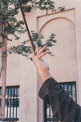 Arabic man spinning stick yowla