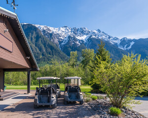 Golf carts on a golf course.