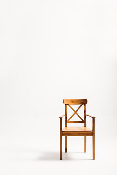 Classical wooden chair isolated against white background