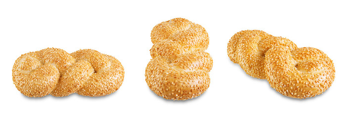 Wheat white braided bread with sesame seeds on a white isolated background