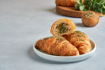 Croissants with zaatar. Closeup  , copy space