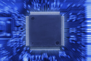 Integrated semiconductor microchip on circuit board, board with motion blur effect.