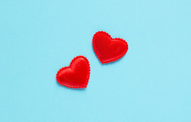 Two hearts close-up on a blue background, valentines, horizontal orientation