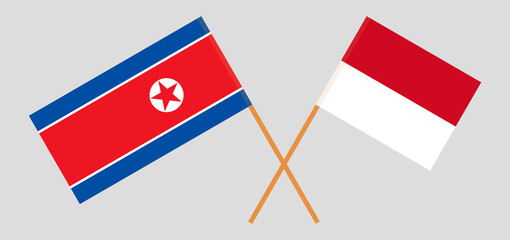Crossed flags of North Korea and Monaco