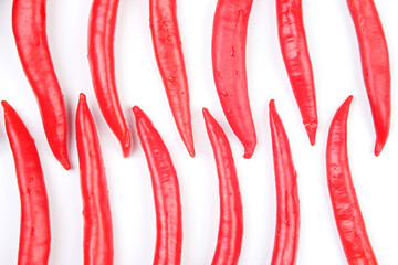 Red hot chili peppers on a white background. Vitamin vegetable food