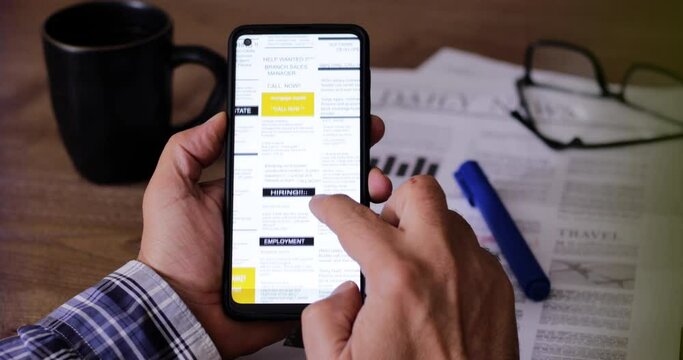 person using mobile phone in the office
