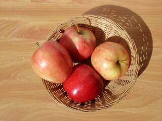 Basket of apples on a table