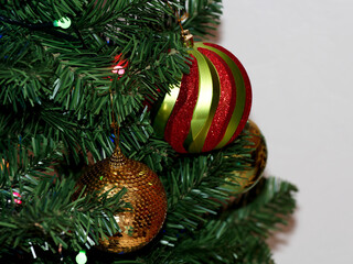 Obraz na płótnie Canvas Christmas balls on an artificial tree. Ecology.