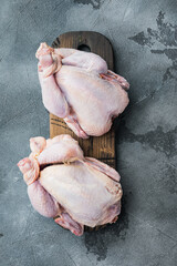 Fresh raw chicken, on gray background, top view