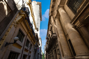 Fototapeta premium Scenic colorful Old Havana streets in historic city center of Havana Vieja near Paseo El Prado and Capitolio.