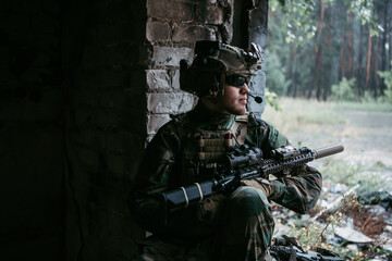 Military men with arms defending the building. Soldier stand guard securing territory looking...