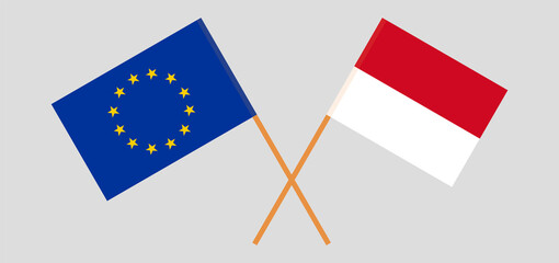 Crossed flags of the European Union and Monaco