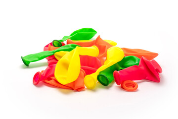 Colorful rubber balloons. White background.