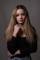 Fototapeta premium Portrait of Teen Girl on Simple Background